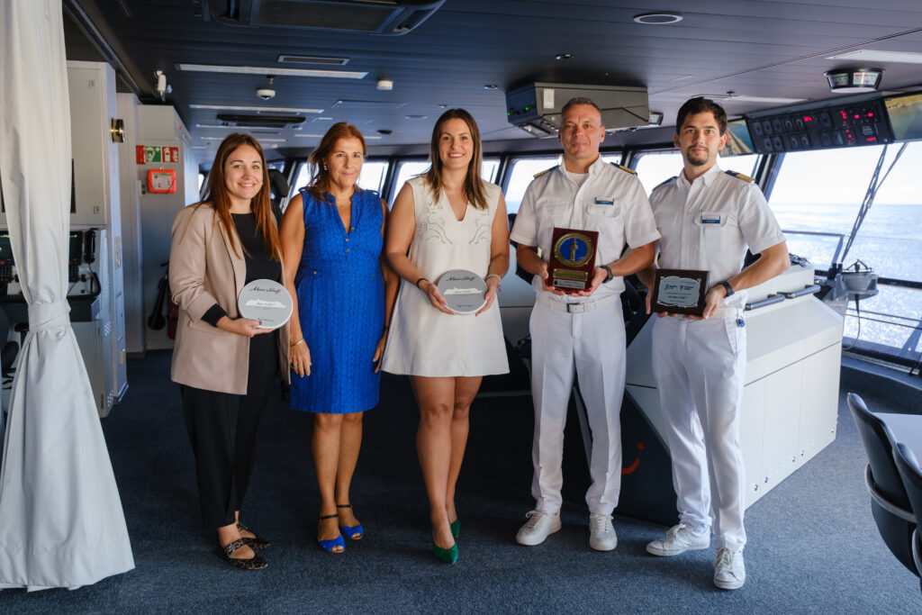 The plaque exchange ceremony, held on the Bridge and hosted by Greek Captain Georgio Di Mou and his crew, featured the Port Authority’s Commercial and Business Development Manager, Luz Marina Espiau, presenting a commemorative plaque to honour this first call. Attendees included First Officer, Chief Purser, Ship Agent Mrs. Davinia, and Mónica Jarque from the Port Authority’s Commercial Department  (Image at LateCruiseNews.com - November 2024